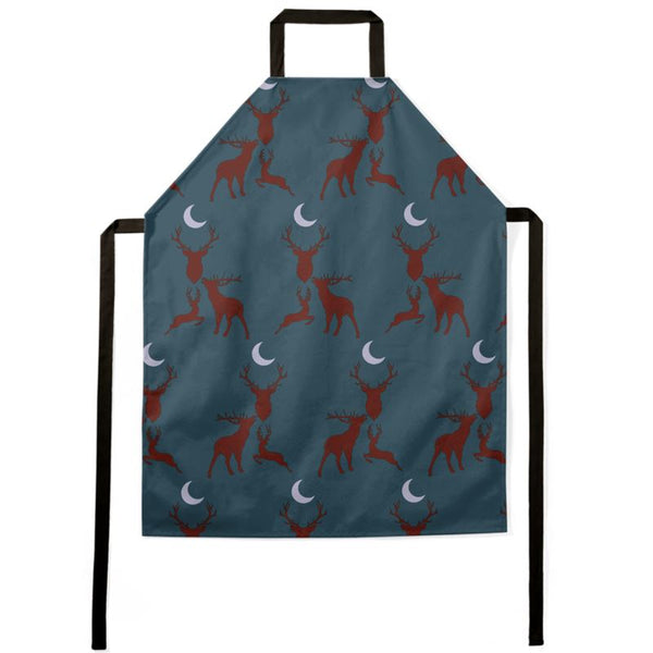 Apron in stag night design. blue apron with red Stags gathered around a crescent moon with black ties
