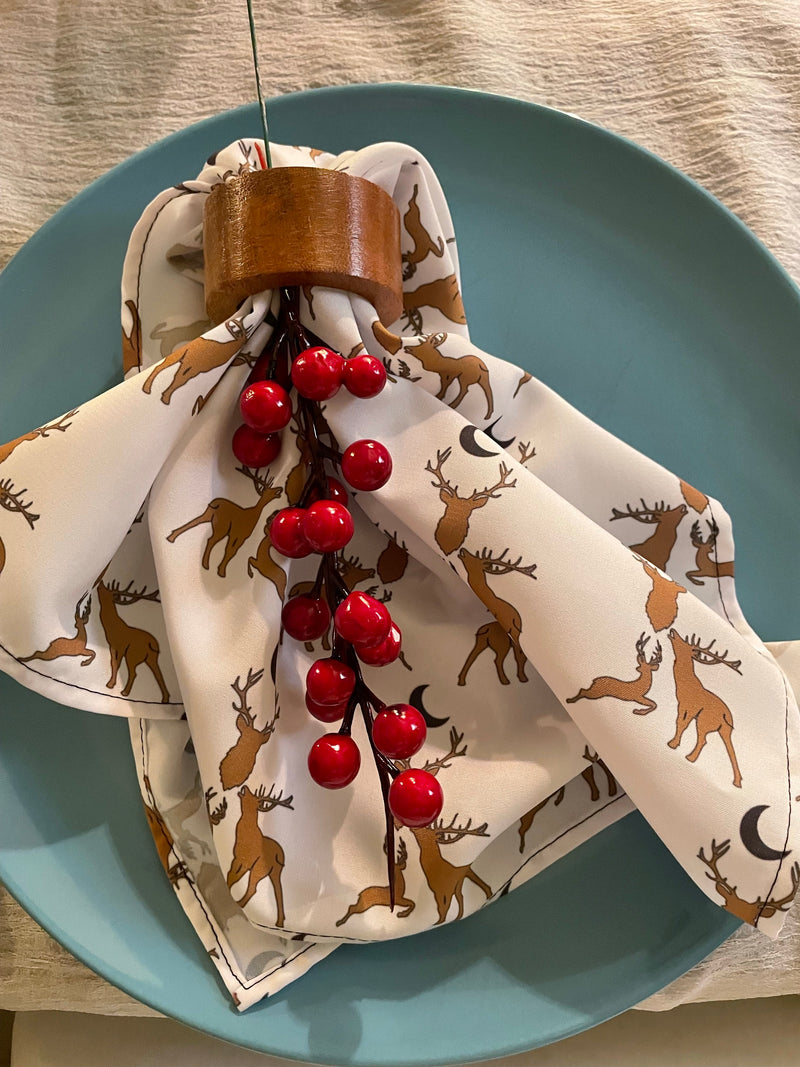 napkin with deer stags on on christmas table
