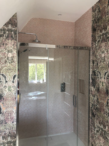Striking wallpaper and tiles in this bathroom Fleur ward